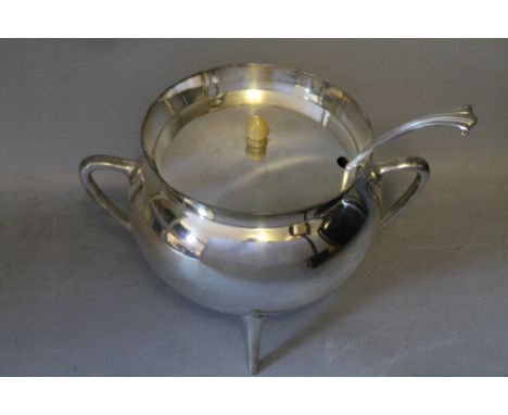 A SILVER PLATED LIDDED TUREEN BY WALKER &amp; HALL IN THE STYLE OF CHRISTOPHER DRESSER, upon three tapering feet,shaped twin 