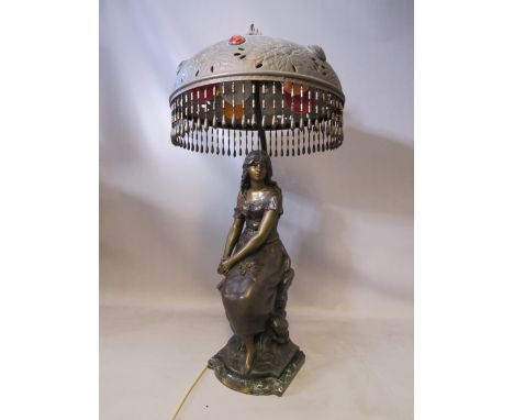 AN ART NOUVEAU STYLE FIGURAL TABLE LAMP SIGNED A MOREAU, in the form of a maiden seated on a rock, raised on a marbled base w