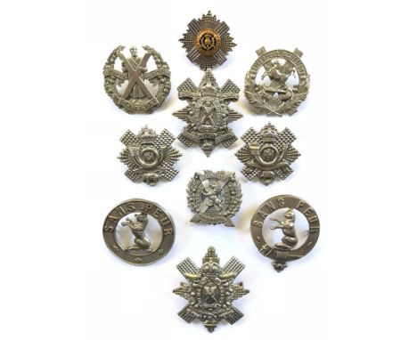 9 assorted Scottish glengarry badges + sporran badge.HLI (short blank scroll) ... HLI (long blank scroll) ... 5th Seaforth (s