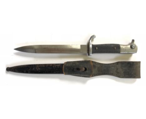 German Third Reich K98 dress bayonet.A good unmarked single edged plated 20 cm blade with fuller.  Plated crossguard with upt