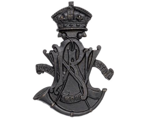 Indian Army. North Western Railway Volunteer Rifles Victorian helmet badge.A good British made die-stamped blackened brass ex