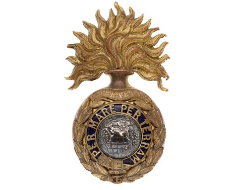 Royal Marine Artillery Officer’s helmet plate circa 1878-1905.A good gilt example. Large flaming grenade, the ball mounted wi