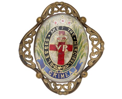 19th Century Crimean Nurse Florence Nightingale JewelA rare 19th century gilt metal and enamel representation of the Florence
