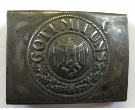 German Third Reich Army belt buckle dated 1942.A good steel example bearing circlet ‘GOTT MIT UNS’; eagle and swastika to cen