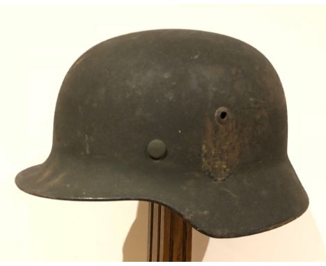 WW2 German Third Reich M35 Army Steel Helmet.A good clean example, the shell with rolled edge and ventilation holes bearing r