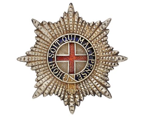 Coldstream Guards Warrant Officer’s cap star.A fine cut silvered example; the Garter pierced with blue enamel ground, central