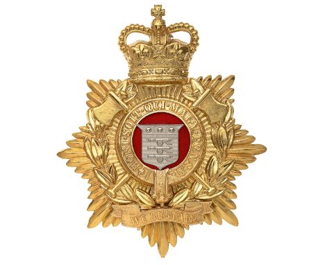 Royal Logistics Corps band helmet plate.A  good post 1994 example. Crowned star bearing laurel sprays and crossed axes mounte