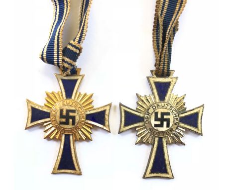 German Third Reich Mother’s Cross 1st Class and 2nd Class.A good gilt example with blue and white enamelled arms and central 