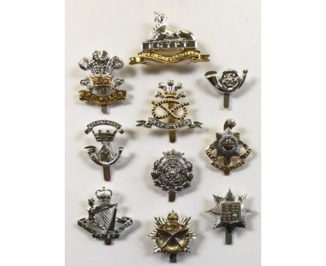 10 assorted early anodised cap badges.The Welch by Gaunt, B’ham ... Royal Lincolnshire ... KOYLI by Smith &amp; Wright ... So