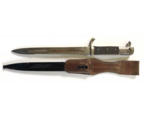 Imperial German sawback parade bayonet by Carl Eichorn circa 1906-21.A good scarce example with plated single edged 25 cm bla