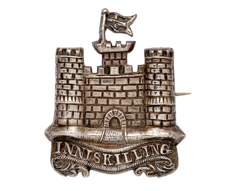 6th Inniskilling Dragoons NCO’s arm badge.A good die-stamped hollow unmarked silver Castle of Enniskillen with St. George’s C