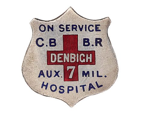 Welsh. WW1 On Service CB BR Denbigh 7 Auxilliary Military Hospital lapel badge.Die-cast silvered shield inlaid with blue enam