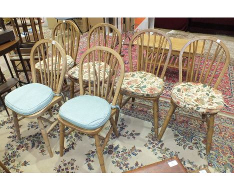 A set of six elm and beech stick-back kitchen chairs, on turned legs with H-stretcher, (6).