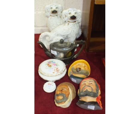 A pair of Staffordshire Spaniel ornaments, 25.5cm high, a Bossons 'Persian' face mask, two similar Legend Products masks, 'Th