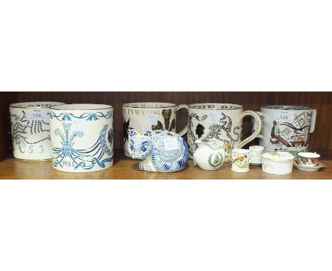 A collection of four Wedgwood commemorative mugs designed by Richard Guyatt, including 'Prince of Wales & Lady Diana Spencer 