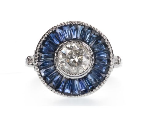 SAPPHIRE AND DIAMOND TARGET RING, the central round brilliant cut diamond of approximately 1.01 carats, within a halo of cali