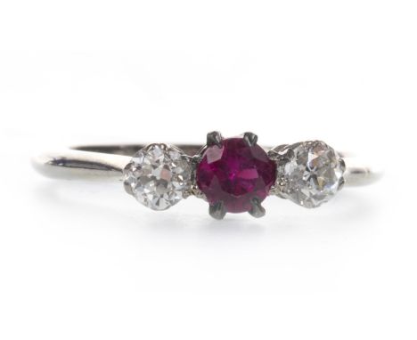 RED GEM SET AND DIAMOND RING, the central red gem flanked by two old cut diamonds totalling approximately 0.16 carats, marked