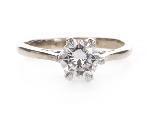 DIAMOND SOLITAIRE RING, the round brilliant cut diamond of approximately 0.73 carats, marked 18CT, size J, 2.7g