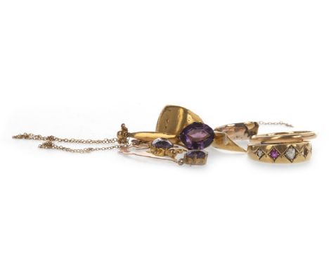 TWO PURPLE GEM SET PENDANTS, each marked 9ct, along with a partial eighteen carat gold red gem set and diamond ring, lacking 