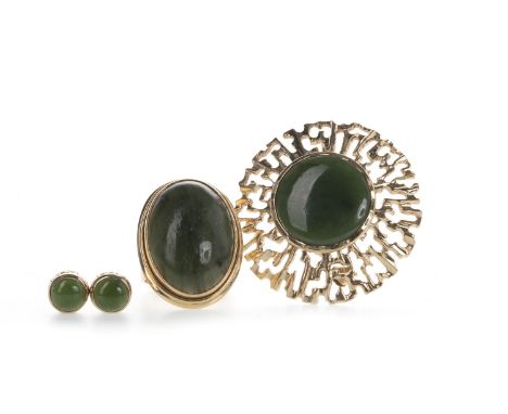GREEN HARDSTONE BROOCH, set with a central round green hardstone within an openwork mount, unmarked, 14.4g, along with a gree