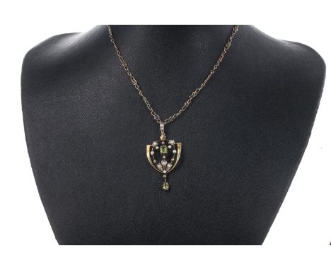 EDWARDIAN GREEN GEM SET AND SEED PEARL PENDANT, with central step cut green gem surrounded by seed pearls and a suspended tea