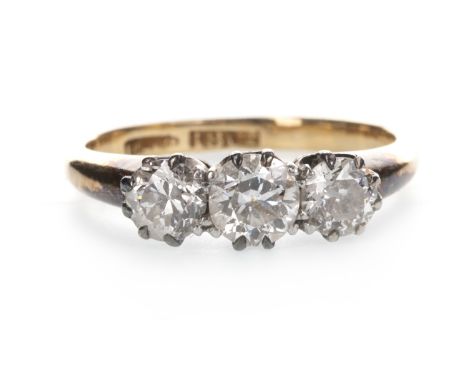 DIAMOND THREE STONE RING, the round brilliant cut diamonds totalling approximately 0.60 carats, marked 18CT, size I 1/2, 3g