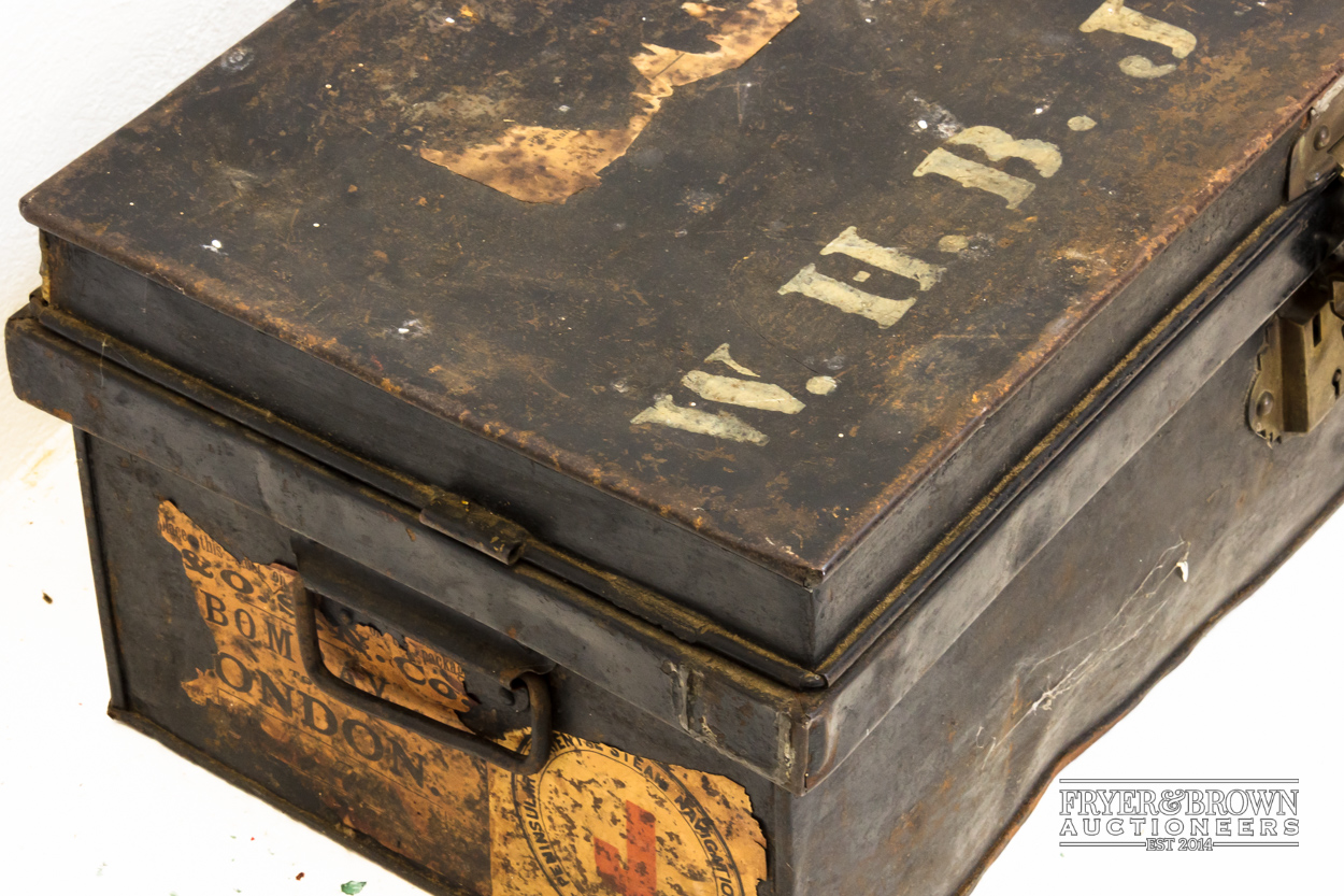 A small metal strong box with handle at side, 61 x 31 x 23 cm; and a