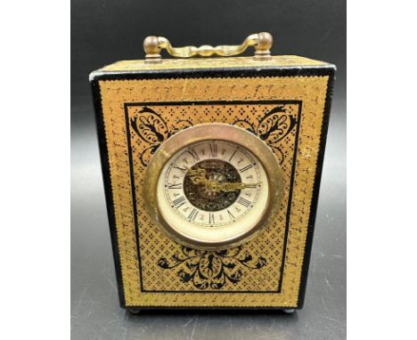 A Mercedes carriage clock, 22ct gold embossed marked Design Philipp