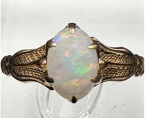 An opal and 9ct gold ring.