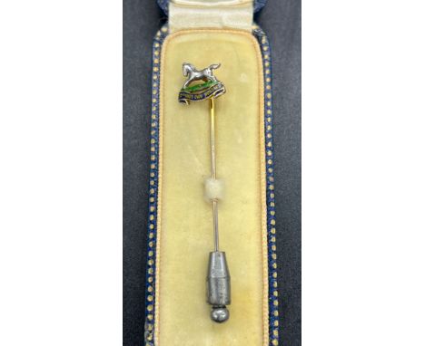 A 9ct gold and enamel lapel pin for the 3rd King's Own Hussars