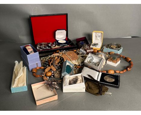 A selection of costume jewellery including some silver
