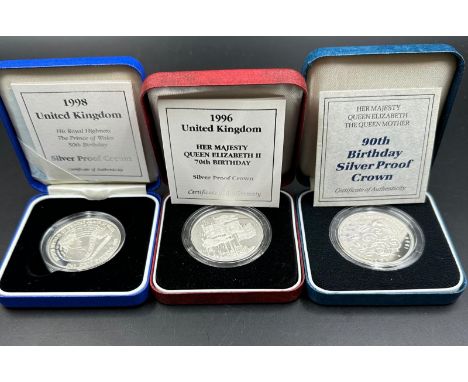 Three Royal Mint silver crowns: 1996 Her Majesty Queen Elizabeth II 70th Birthday, 90th Birthday, 1998 His Royal Highness The