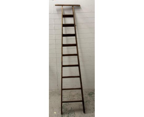 A vintage set of library steps or ladders H244cm 