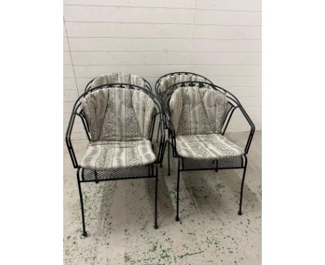A set of four black metal garden chairs with grey and silver upholstered cushions 