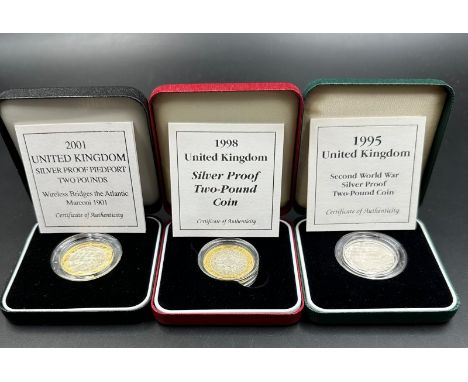 Three Royal Mint silver proof two pound coins: 1995 Second world War, 2001 Wireless Bridges the Atlantic Marconi 1901 and 199