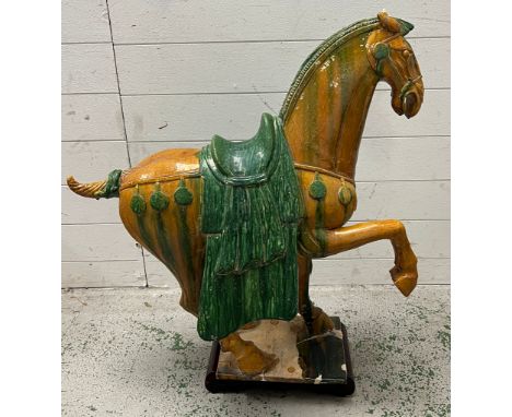 A glazed ceramic Tang Dynasty style horse (H90cm W80cm)