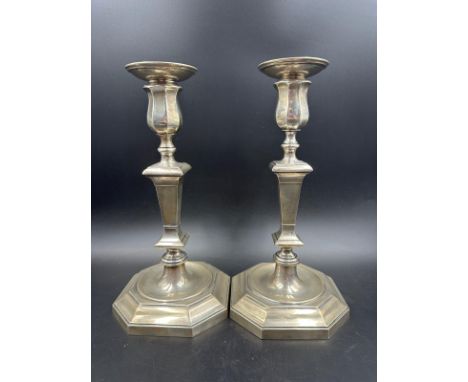 A pair of silver candlesticks with detachable sconces. Height 26.5cm hallmarked for Birmingham 1957 by Ellis & Co (Filled bas