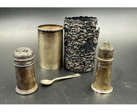 A selection of silver items to include a salt and pepper and a salt spoon various hallmarks approx weight 108g