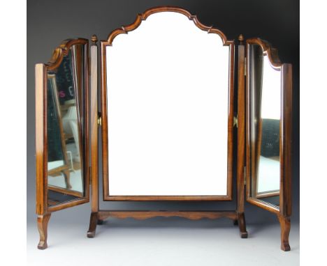 An early 20th century walnut tryptic mirror, with cushion frame, 65cm H 