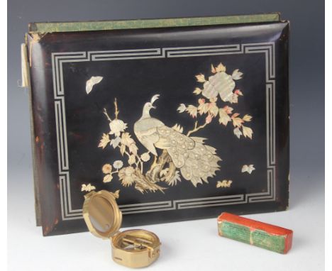 A selection of early 20th century and later postcards, many Chinese scenes and some military, in a lacquered album; A Stanley