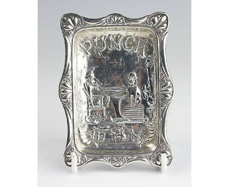 A Victorian silver novelty 'Punch' ash tray, Edward Durban & Co, Birmingham 1878, embossed with a central scene surrounded by