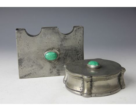A continental Porto Fecit VCM pewter desk stand and inkwell, each set with a cabochon mount (2)