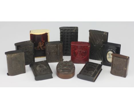 A collection of twelve vesta cases, to include; Ebonite examples depicting: Edward VIII, Victoria, initialled 'FEU', square d