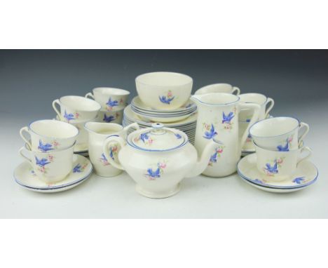 A Scotch Ivory forty one piece tea service, decorated with spring swallows (41)