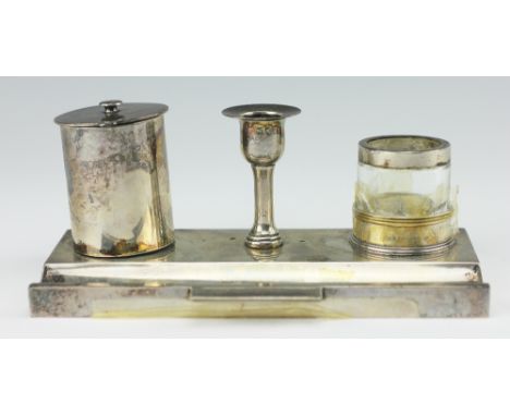 A Victorian silver inkstand, Chas and George Asprey, London 1893, the rectangular tray base with pen reservoir and striker, s