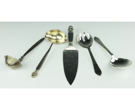 Five Georg Jensen silver ladles and servers, comprising an Acorn pattern double lipped ladle and serving slice, a cactus patt