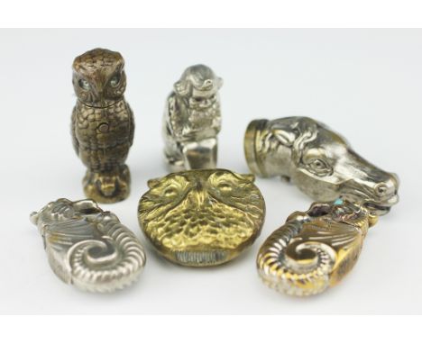 Six novelty vesta cases, to include; a 'Royal Sec' horses head with press button opening 6cm high, a brass owl perched 5.5cm 