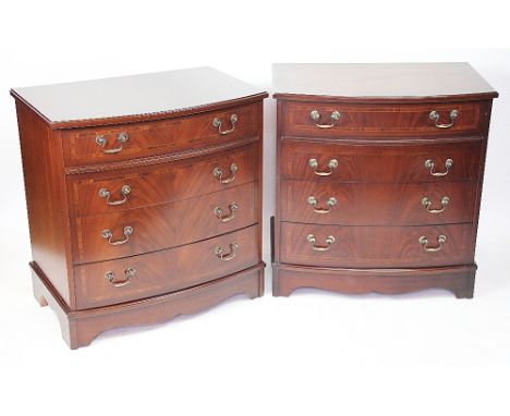 A pair of reproduction mahogany bow front chest of drawers, with four graduated long drawers, on bracket feet, 72cm H x 78cm 
