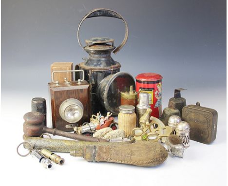 A miscellany of objects to include a vintage Railway signal mans lamp, an Ever Ready oak lamp, two base metal pig pin cushion