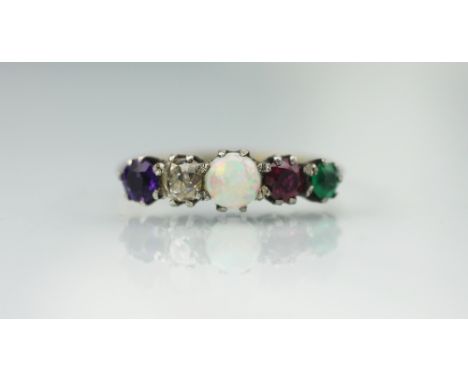 An ADORE ring, set with an amethyst, diamond, opal ruby and emerald, each graduated stone claw set to the tapering shoulders 